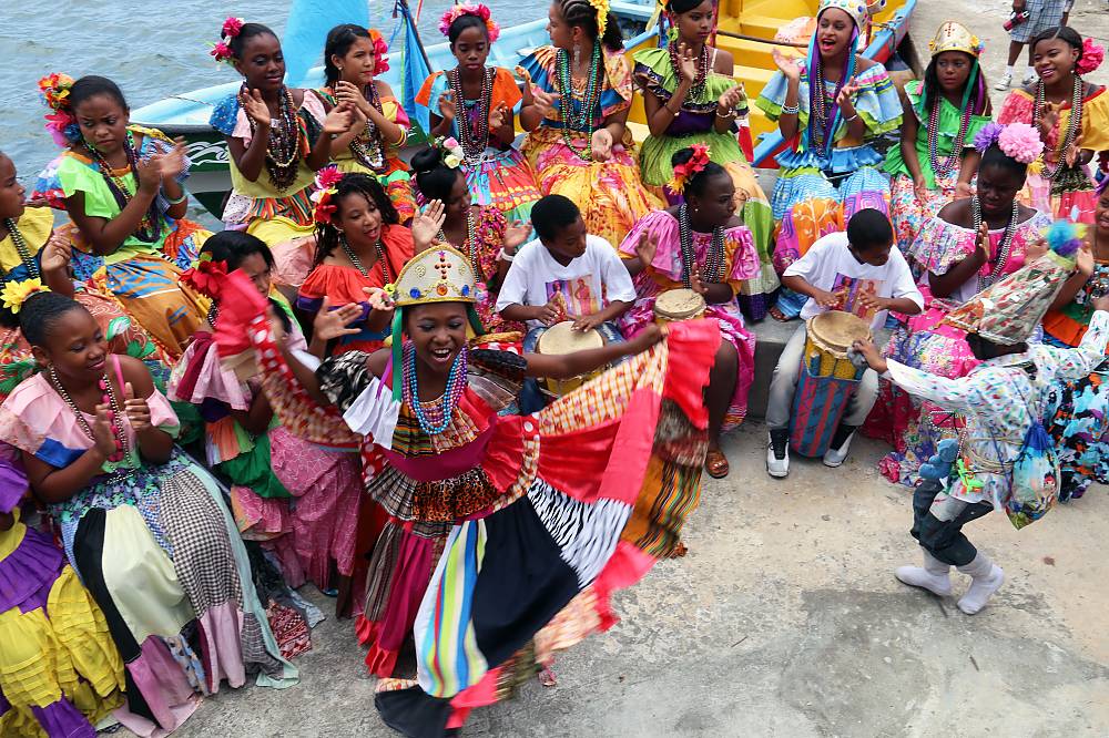 Young Congo group dancing and playing the drum during the Congo's Pollera Festival in Portobelo